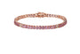Oval pink sapphire and diamond tennis bracelet