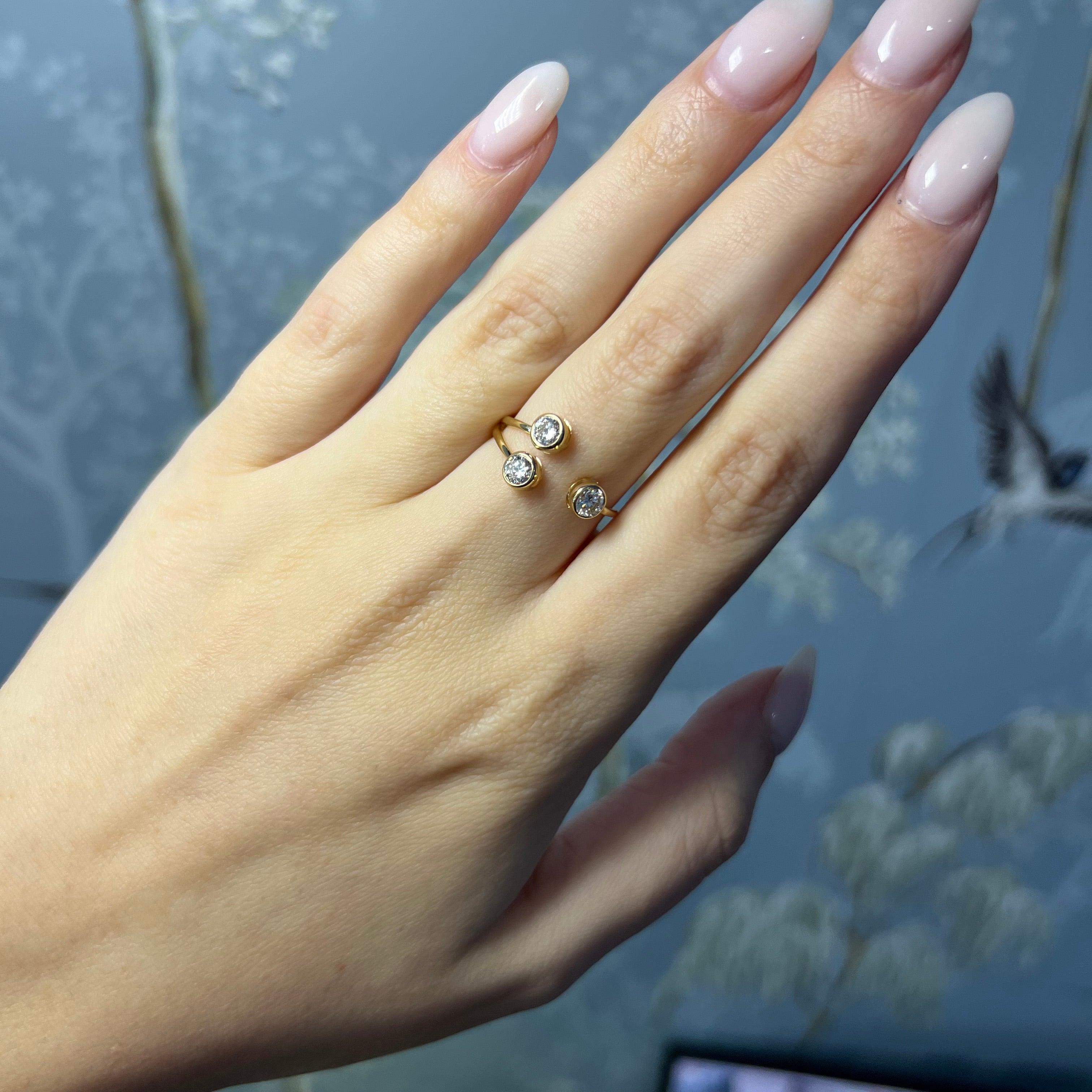 14k Yellow Gold Open Ring with Three Bezeled Diamonds