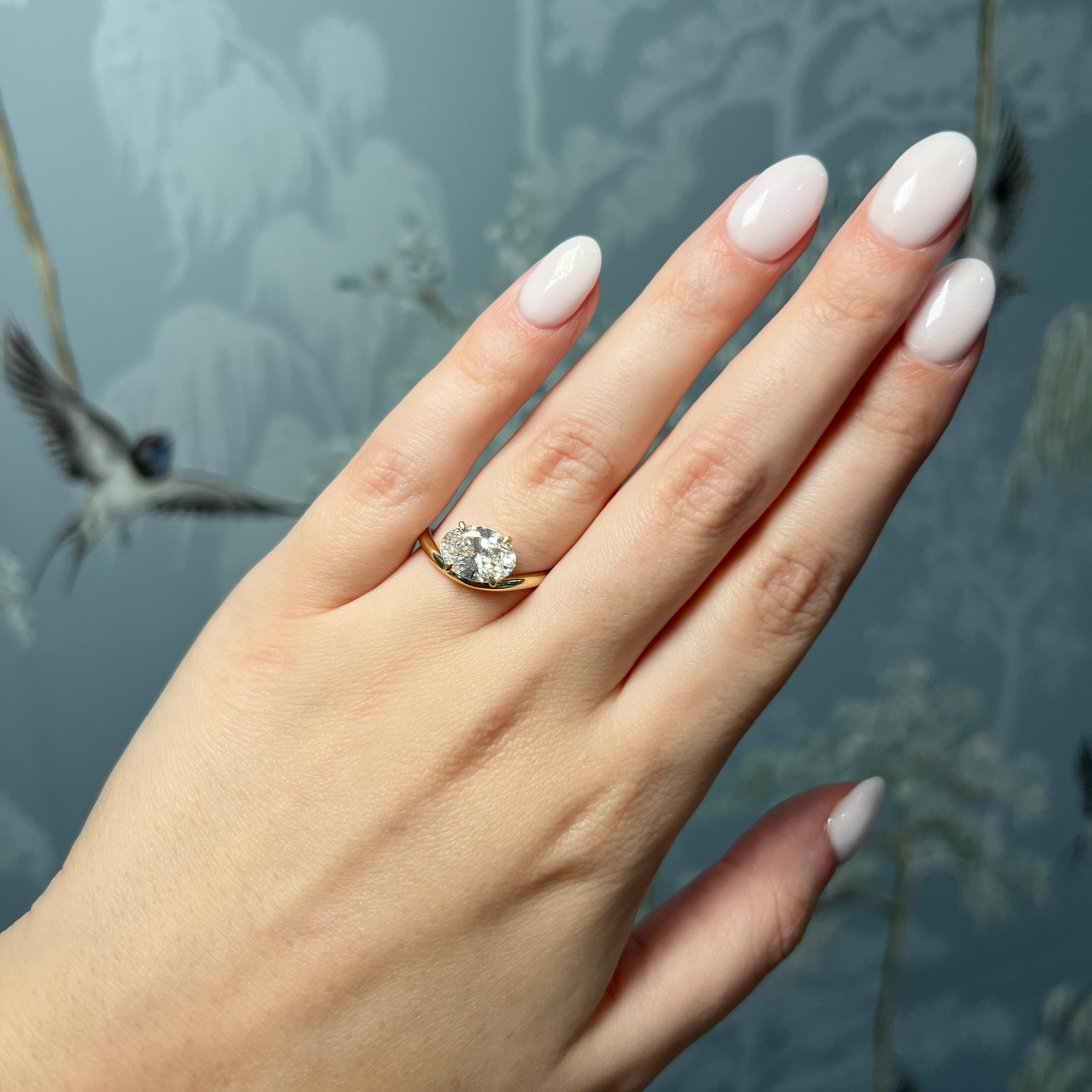Gold Wave Ring with 2ct Oval Diamond