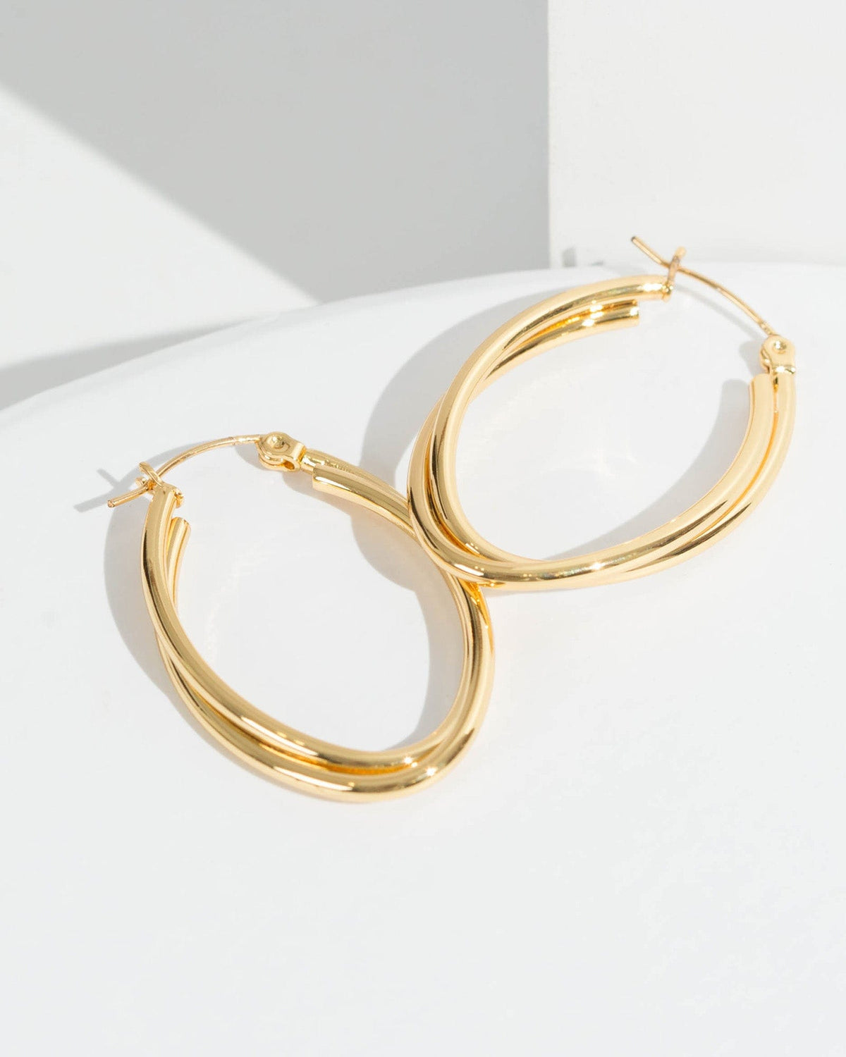 14k Yellow Gold Twisted Oval Hoop