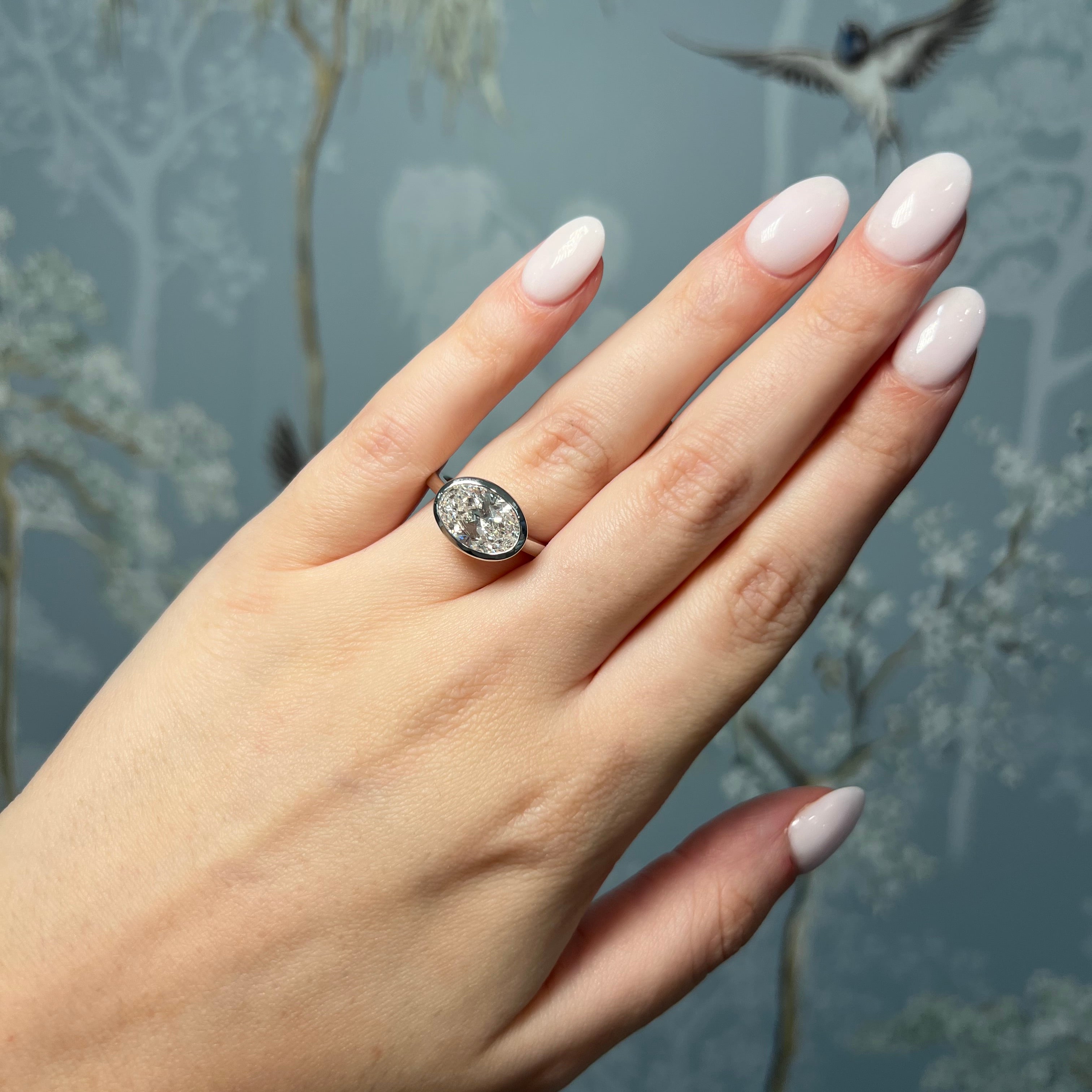 White Gold Bezel Set 3ct Oval Diamond Ring