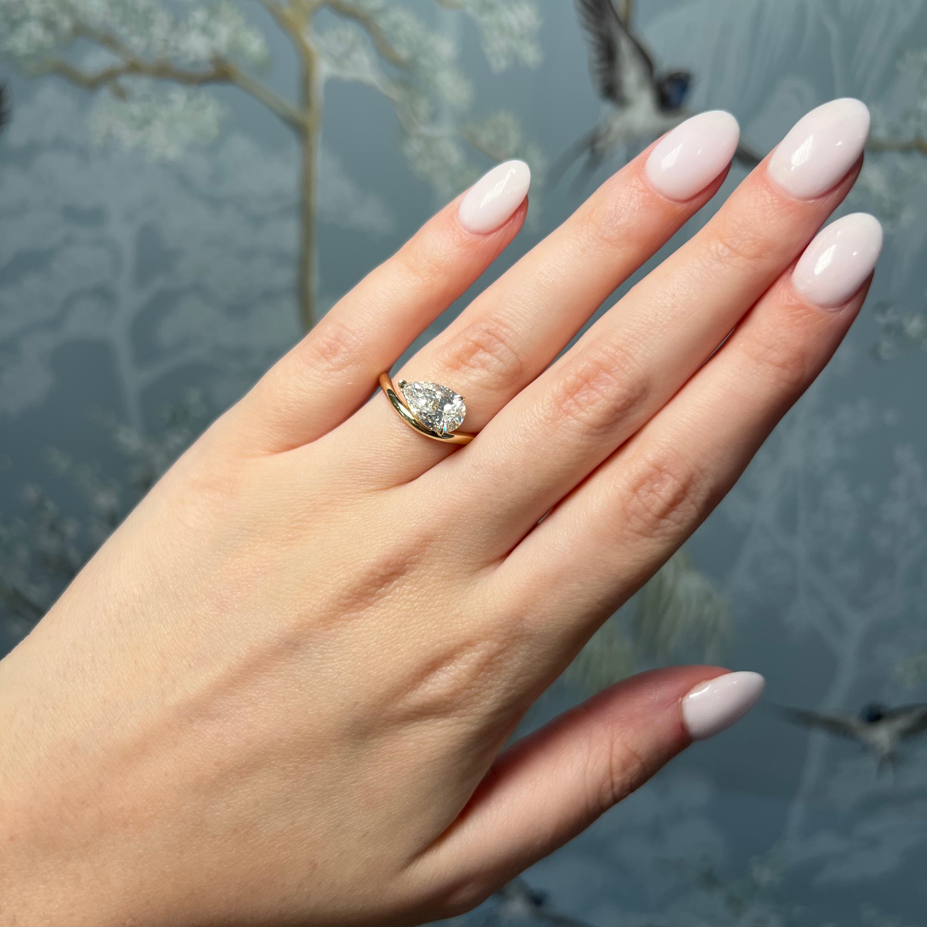 Gold Wave Ring with 2ct Pear Diamond