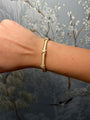 14K Yellow Gold Tobogas Diamond X Bangle