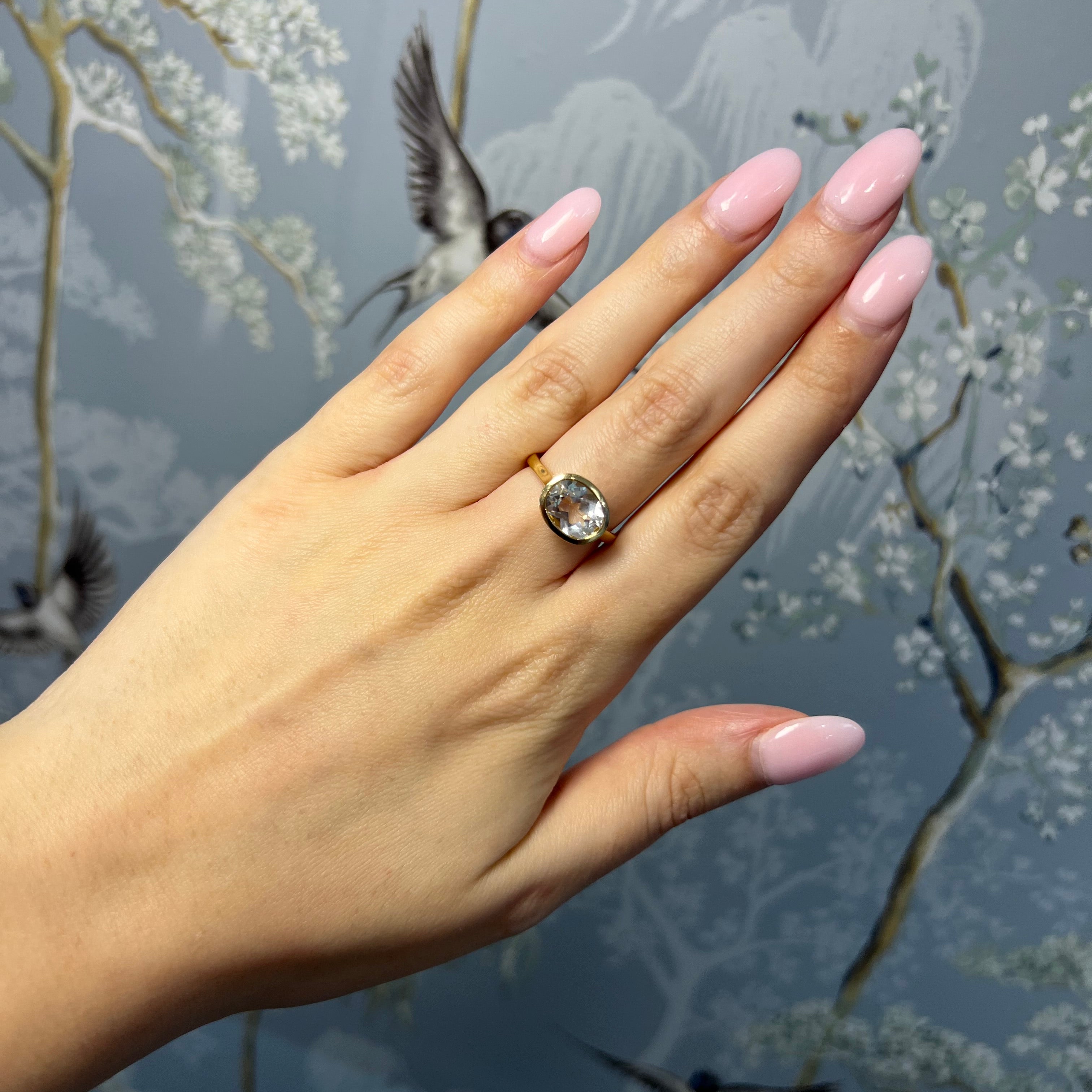 Oval White Topaz Bezel Ring