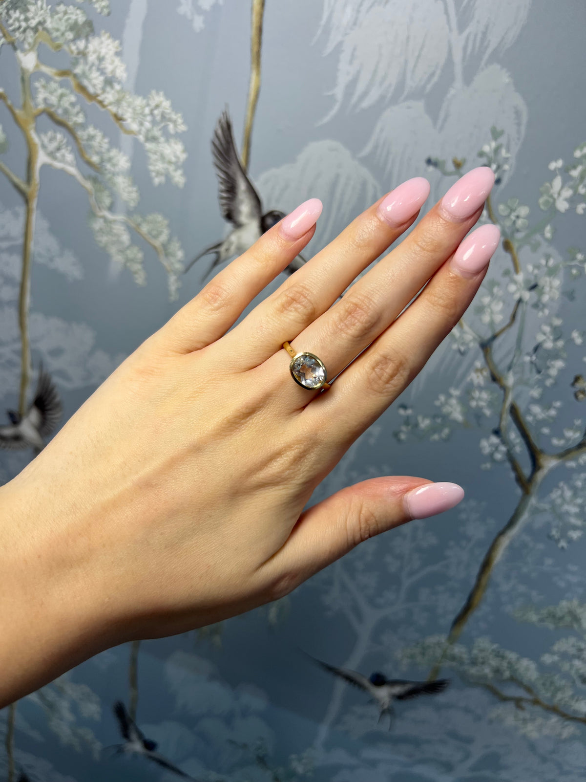 Oval White Topaz Bezel Ring